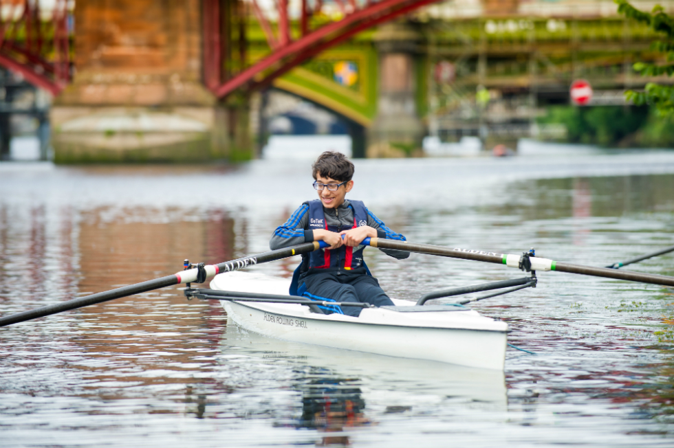 Young people learn to row