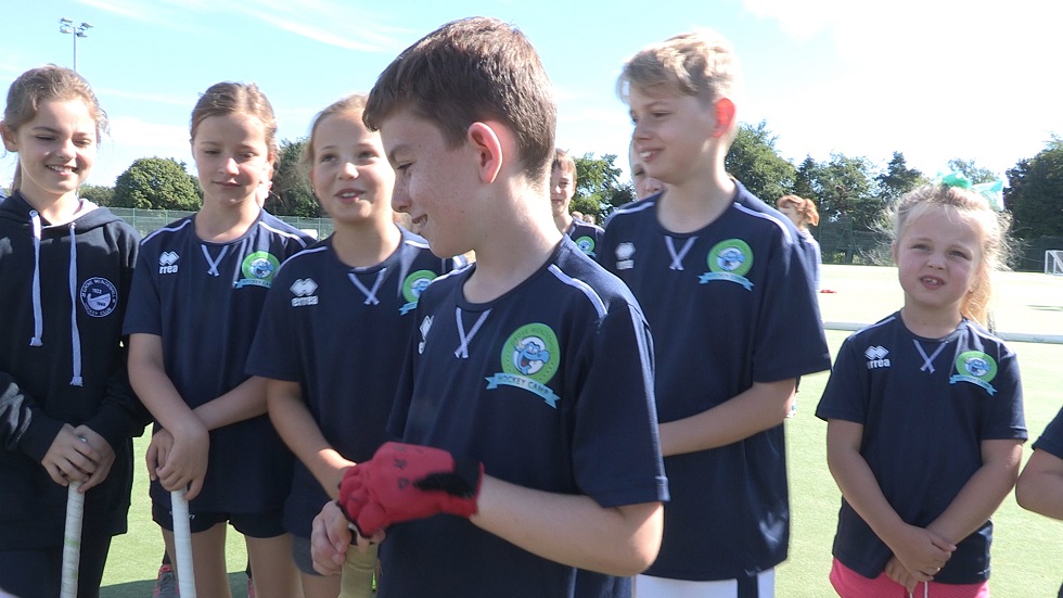 Alfie Bonnar and fellow junior players at the Grove Menzieshill Hockey Club summer camp