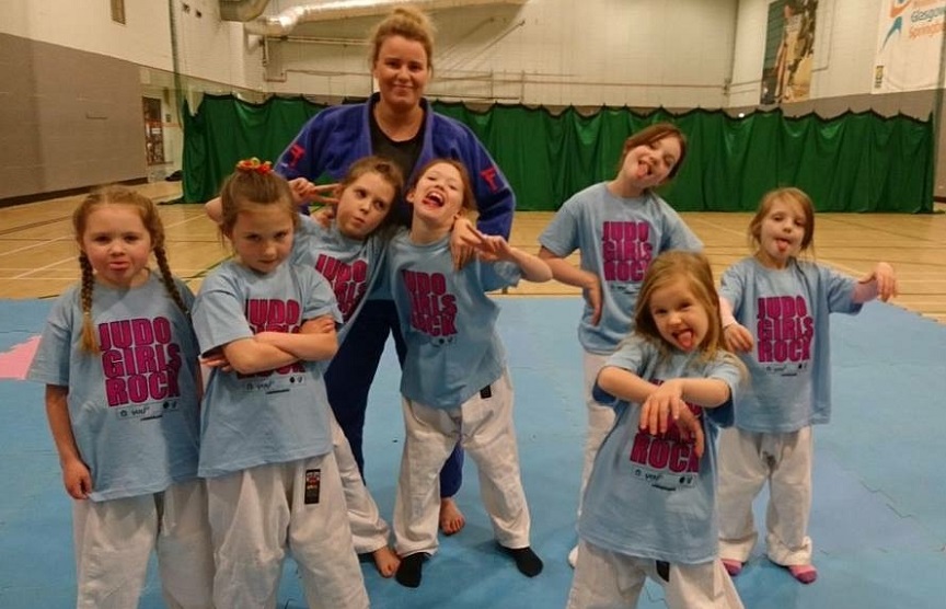 Rebecca Maclean with one of her classes at Judo Girls Rock