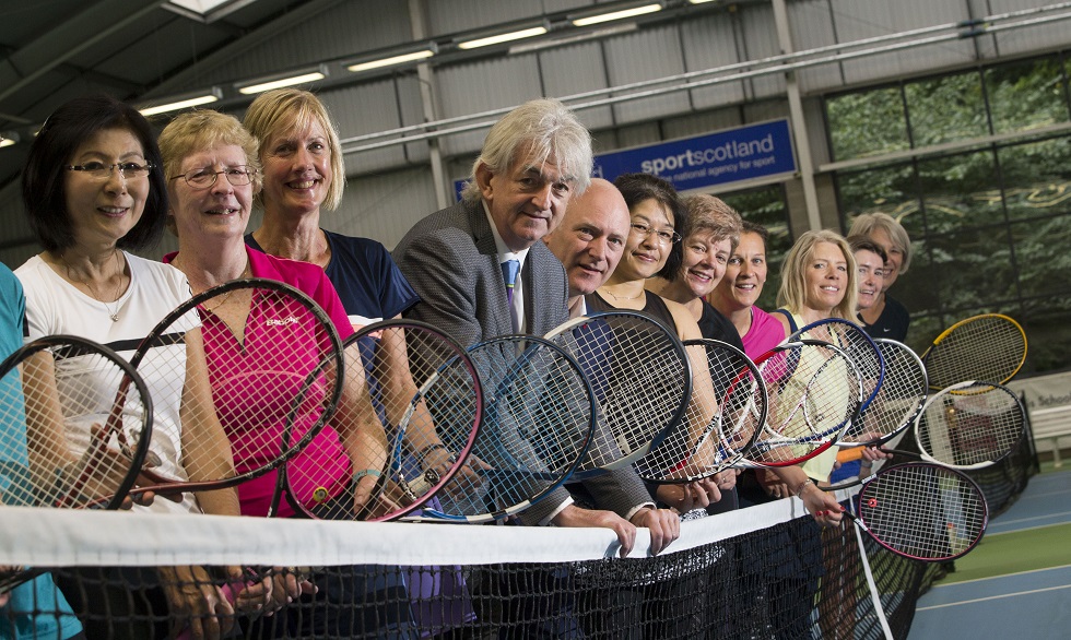 Sports Minister Joe FitzPatrick and sportscotland chair Mel Young with female tennis players