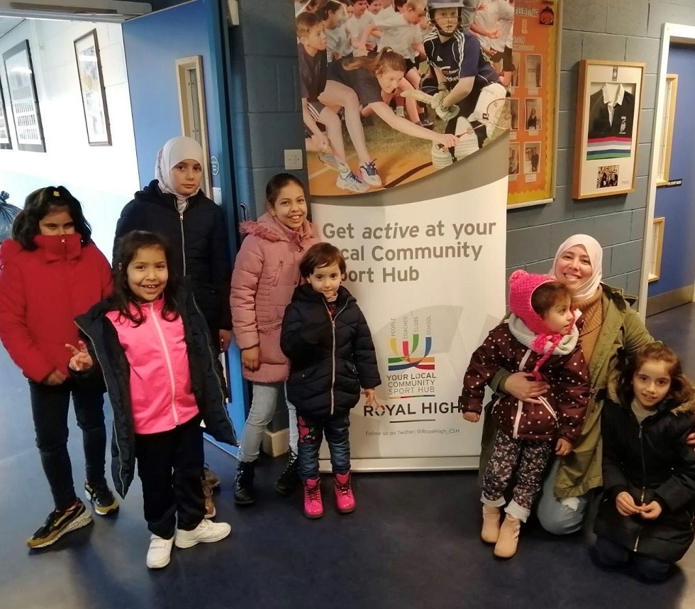 Syrian refugee families visit a swimming pool in Edinburgh 