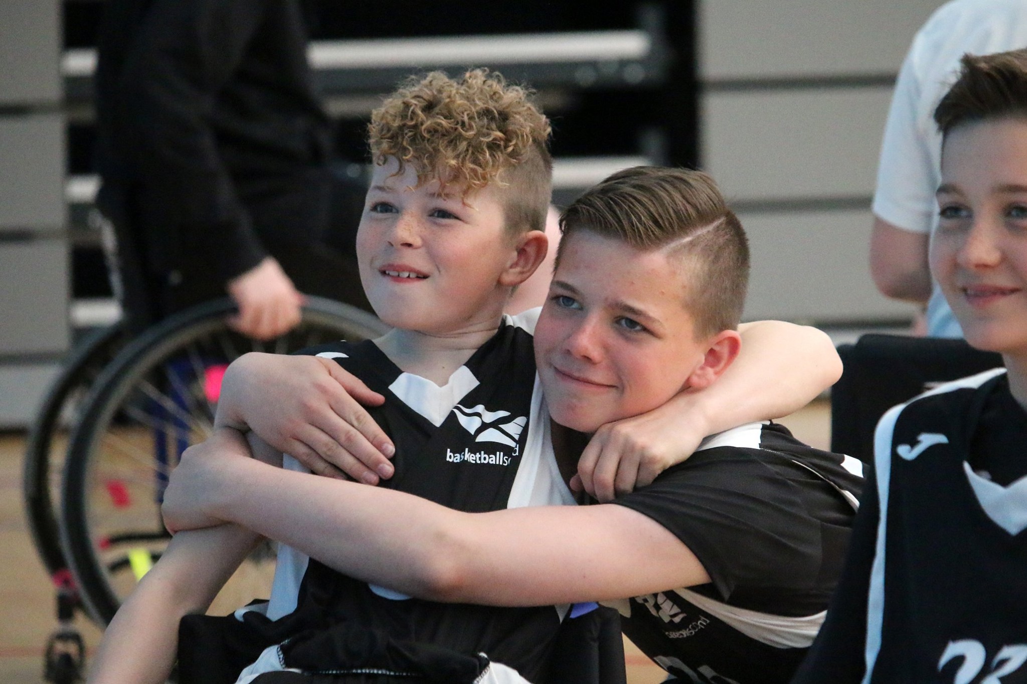 Wheelchair basketball participants celebrate win