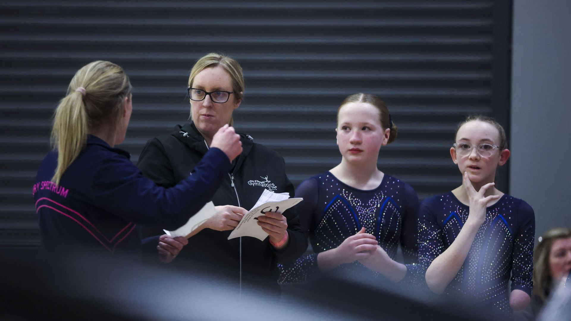 Angela Turner with para gymnasts at artistic champs 2026.jpg